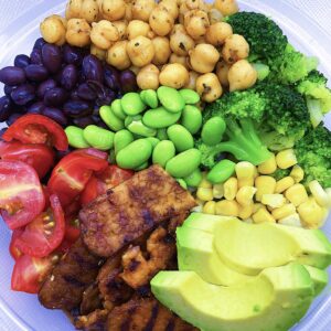 BBQ tempeh Burrito Bowl Served with brown rice, broccoli, edamame, and stir fry mixed vegetables