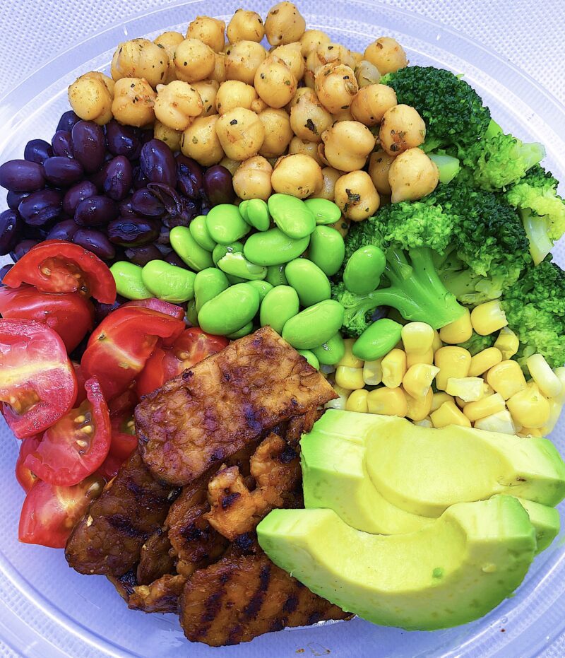 BBQ tempeh Burrito Bowl Served with brown rice, broccoli, edamame, and stir fry mixed vegetables