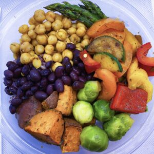 Lemon tahini, roasted sweet potatoes, beans, chick peas, asparagus, and mixed vegetables