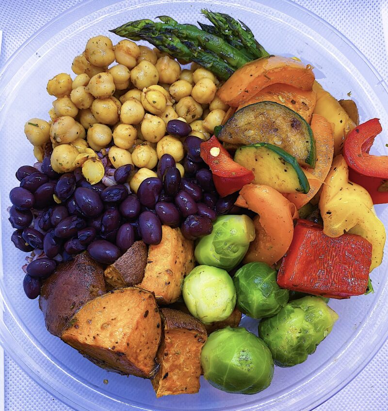 Lemon tahini, roasted sweet potatoes, beans, chick peas, asparagus, and mixed vegetables