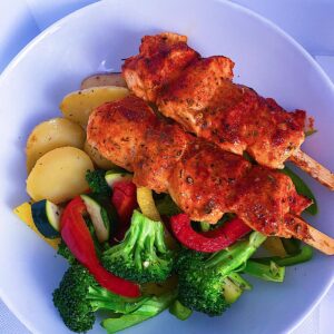 Baked Chicken Kabobs. Served with roasted potatoes and mixed vegetables