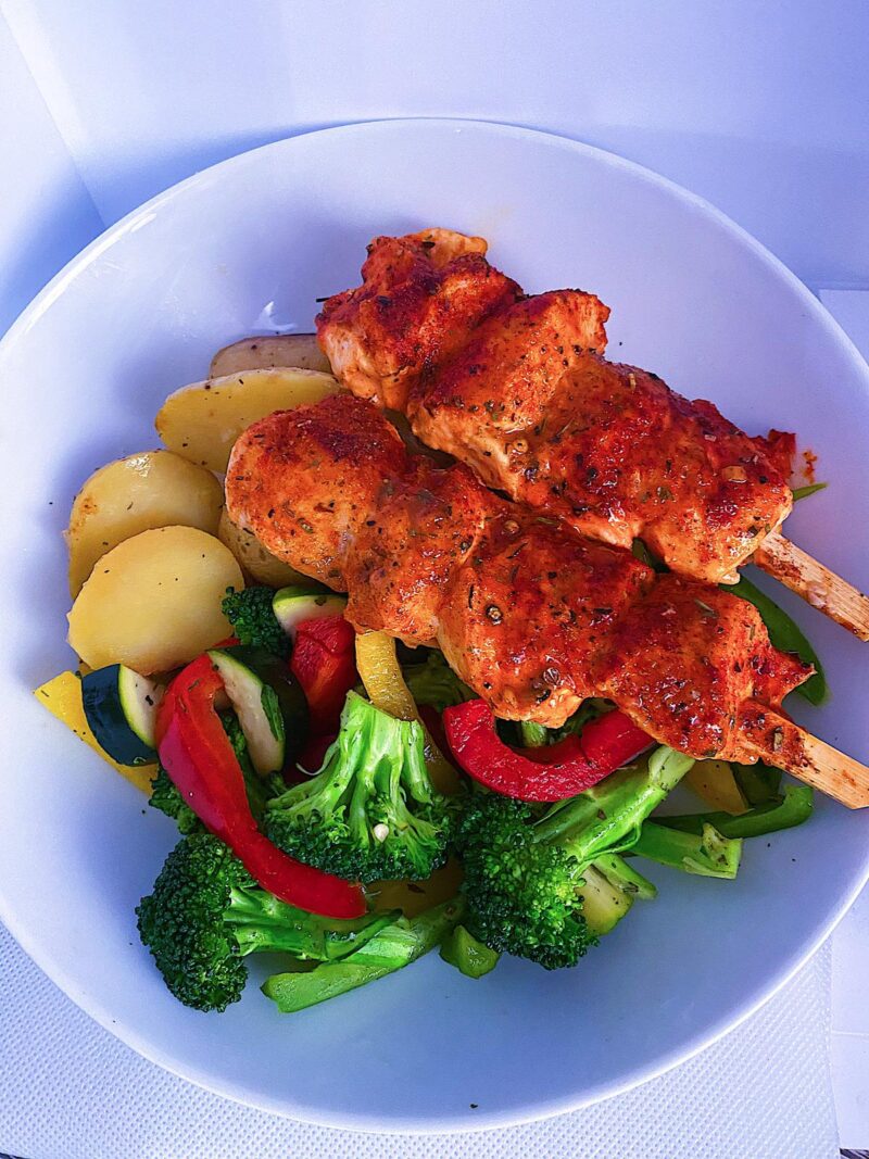 Baked Chicken Kabobs. Served with roasted potatoes and mixed vegetables