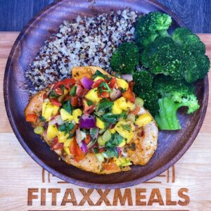 Honey lime chicken served with quinoa, broccoli, and our home-made mango salad