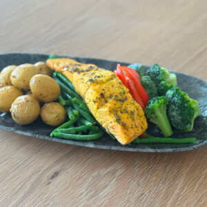 Lemon Pepper Salmon served with a side of basmati rice, broccoli, bell peppers, and a side of tartar sauce